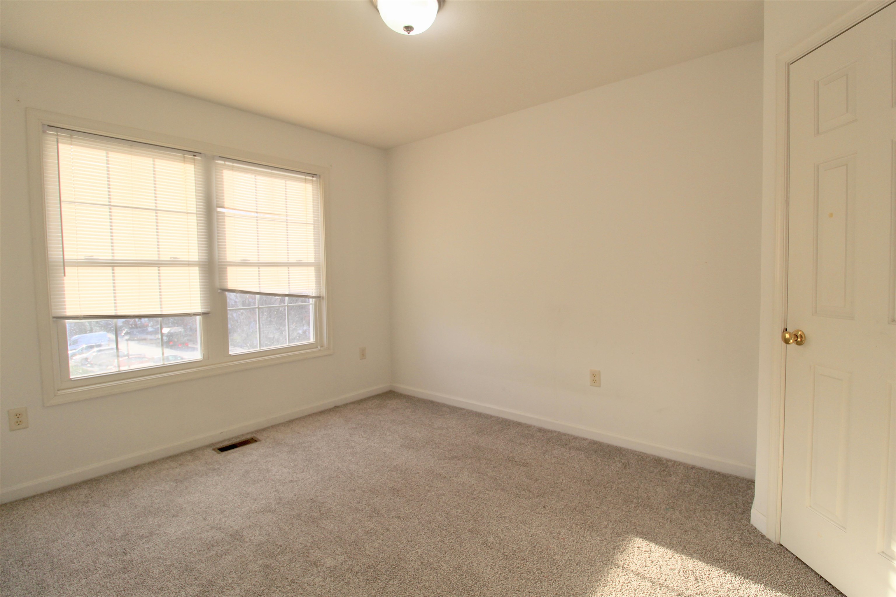 2911 Diamond Spring Lane Harrisonburg, VA 22801 - Photo 14 of 23 an empty room with a window