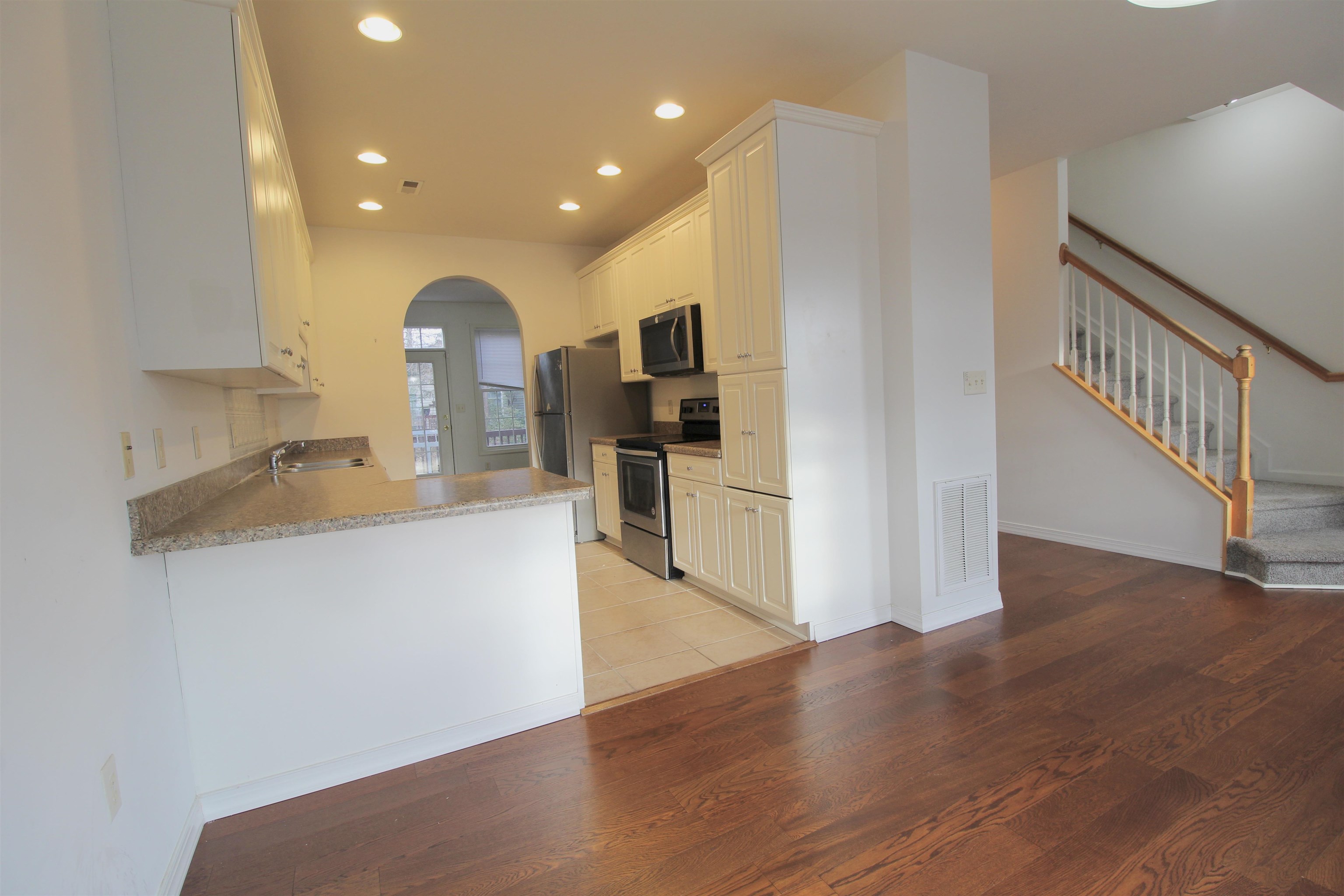 2911 Diamond Spring Lane Harrisonburg, VA 22801 - Photo 5 of 23 a view of kitchen with wooden floor and electronic appliances