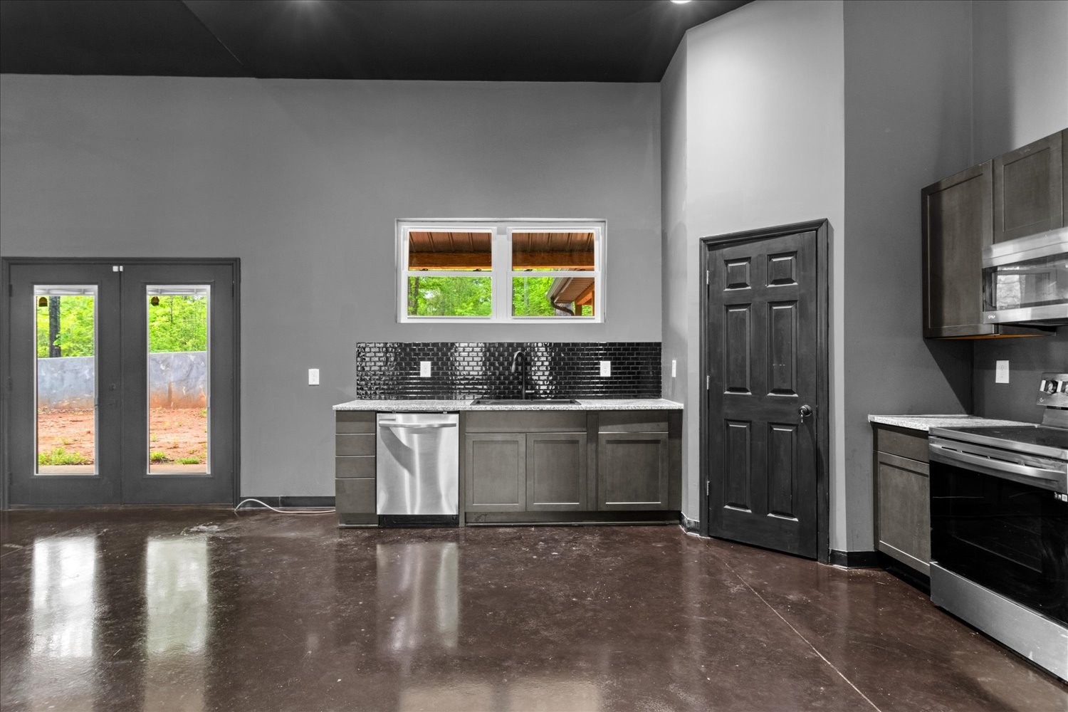 8360 Pinewood Road Lyles, TN 37098 - Photo 15 of 49 a kitchen with a stove and a refrigerator