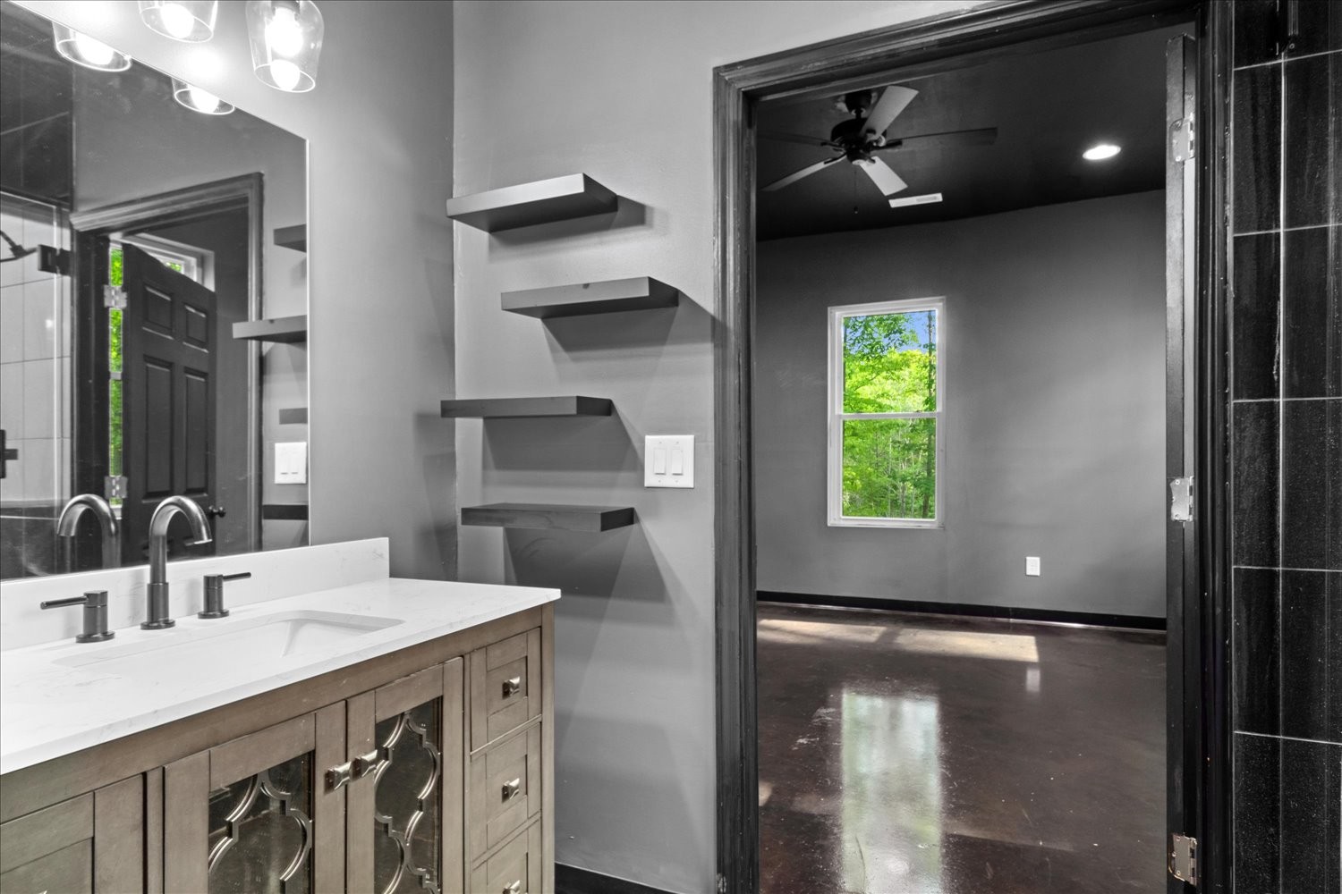 8360 Pinewood Road Lyles, TN 37098 - Photo 21 of 49 a bathroom with a sink a light fixture and a window