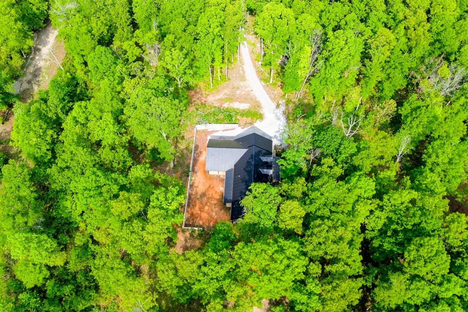 8360 Pinewood Road Lyles, TN 37098 - Photo 41 of 49 an aerial view of a house with a yard and garden view
