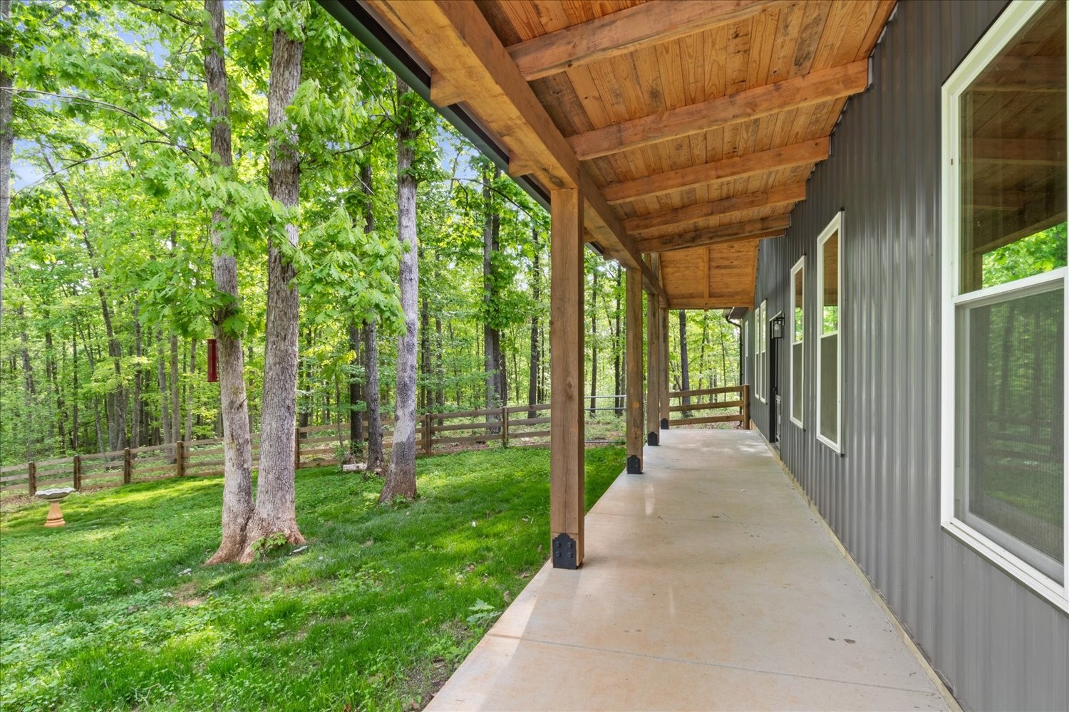 8360 Pinewood Road Lyles, TN 37098 - Photo 8 of 49 a view of a backyard with pathway