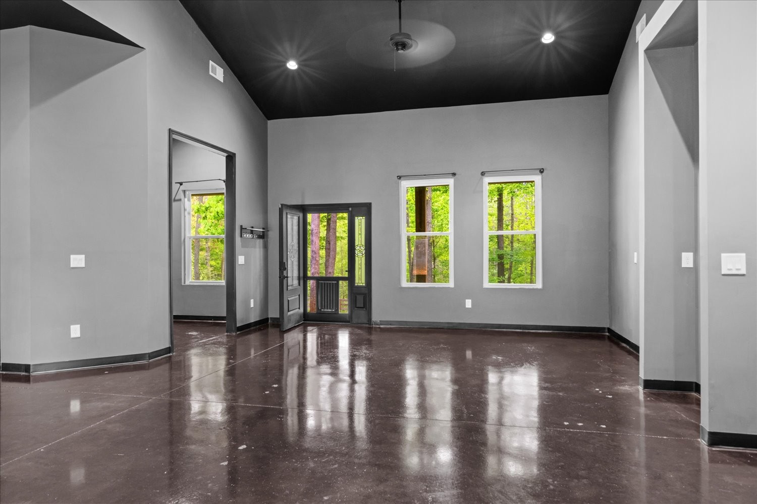 8360 Pinewood Road Lyles, TN 37098 - Photo 10 of 49 a view of an empty room with window and wooden floor
