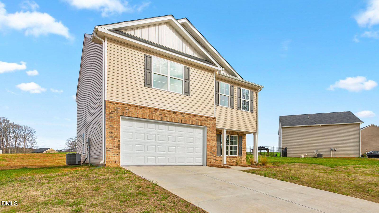 133 Daniel Road Wilson's Mills, NC 27577 - Photo 2 of 26 a front view of a house with a outdoor space