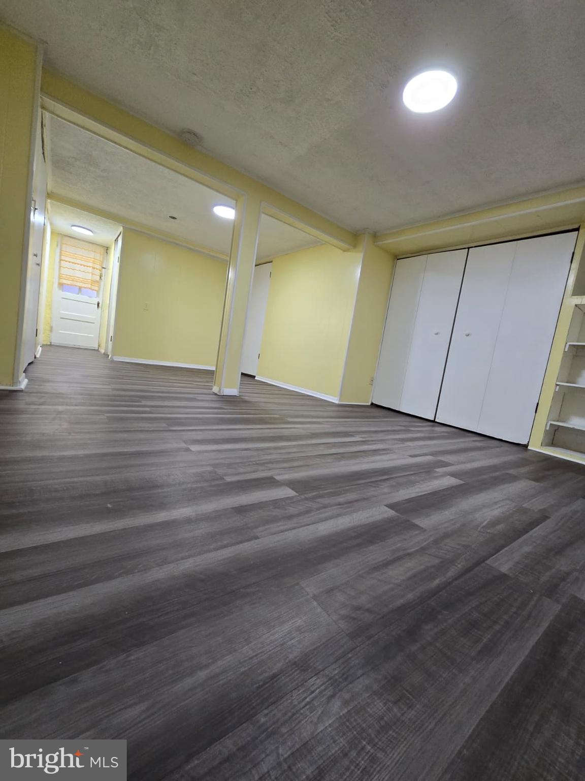 6105 Frederick Road Catonsville, MD 21228 - Photo 30 of 38 a view of an empty room with wooden floor