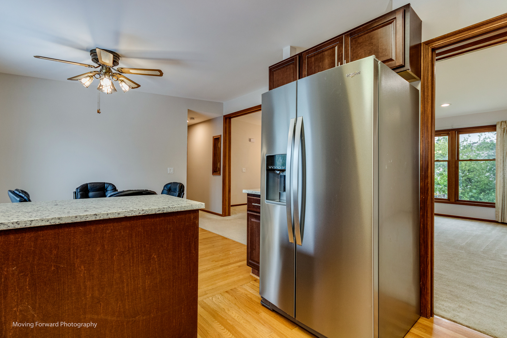 37 Evergreen Road Streamwood, IL 60107 - Photo 14 of 36 a kitchen with stainless steel appliances granite countertop a refrigerator a oven and a sink with wooden floor