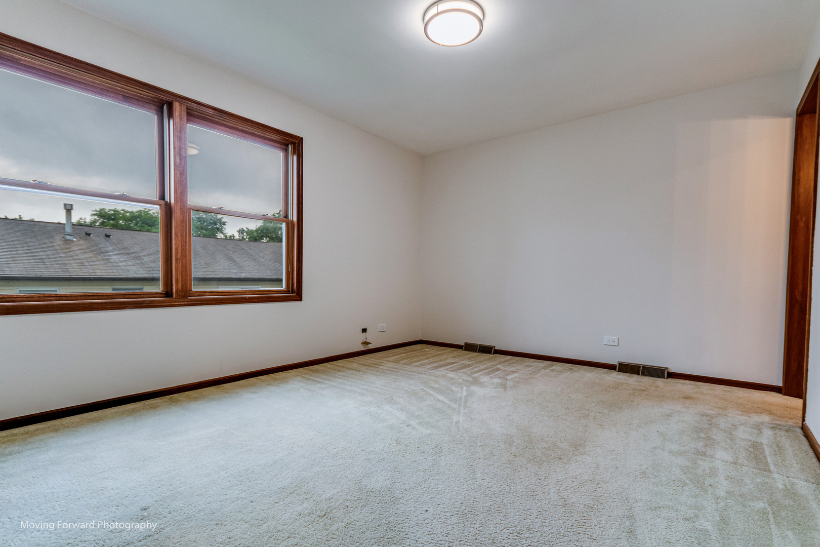 37 Evergreen Road Streamwood, IL 60107 - Photo 18 of 36 a view of an empty room with a window