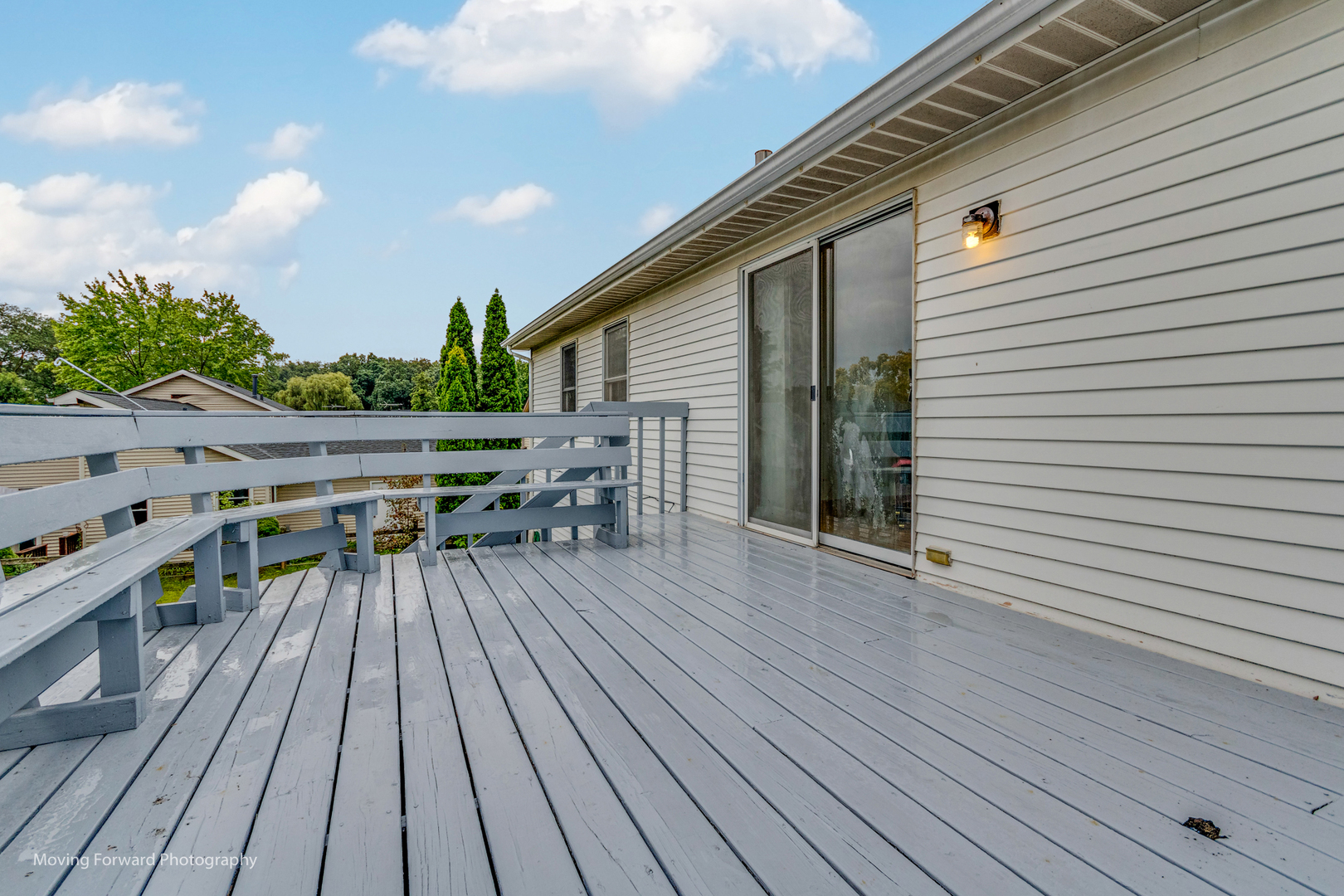 37 Evergreen Road Streamwood, IL 60107 - Photo 29 of 36 a balcony with wooden floor and outdoor seating