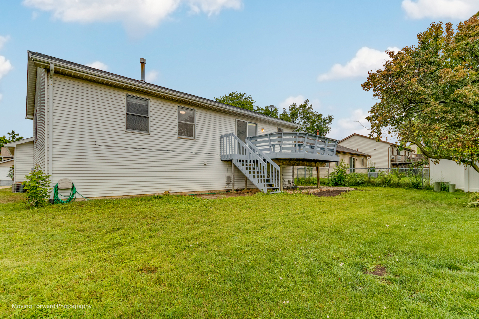 37 Evergreen Road Streamwood, IL 60107 - Photo 31 of 36 a view of a house with a backyard