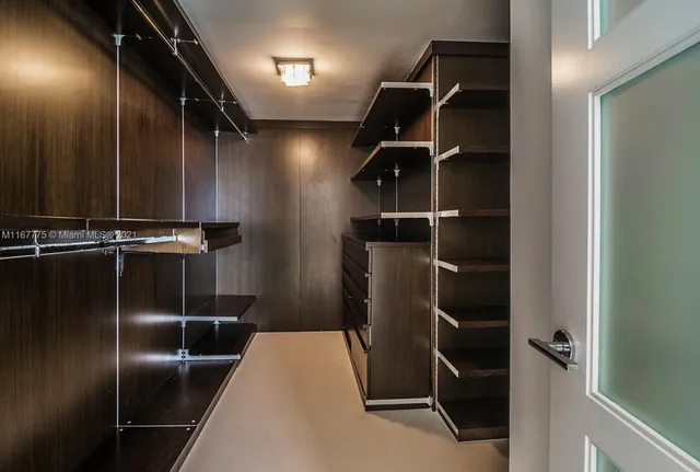 a outdoor living space with furniture and a potted plant