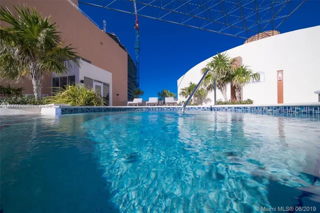 a view of a terrace with furniture and a potted plant