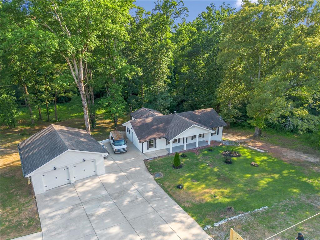 a aerial view of a house with garden