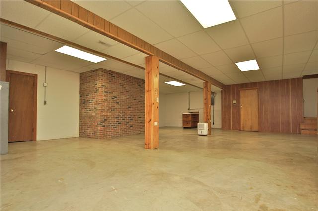 7235 Appleview Road Goodlettsville, TN 37072 - Photo 16 of 20 This area of the basement has a 210 outlet for a stove and and a full bath with shower.