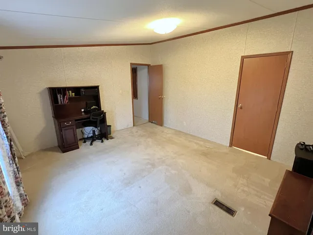 a view of livingroom with furniture