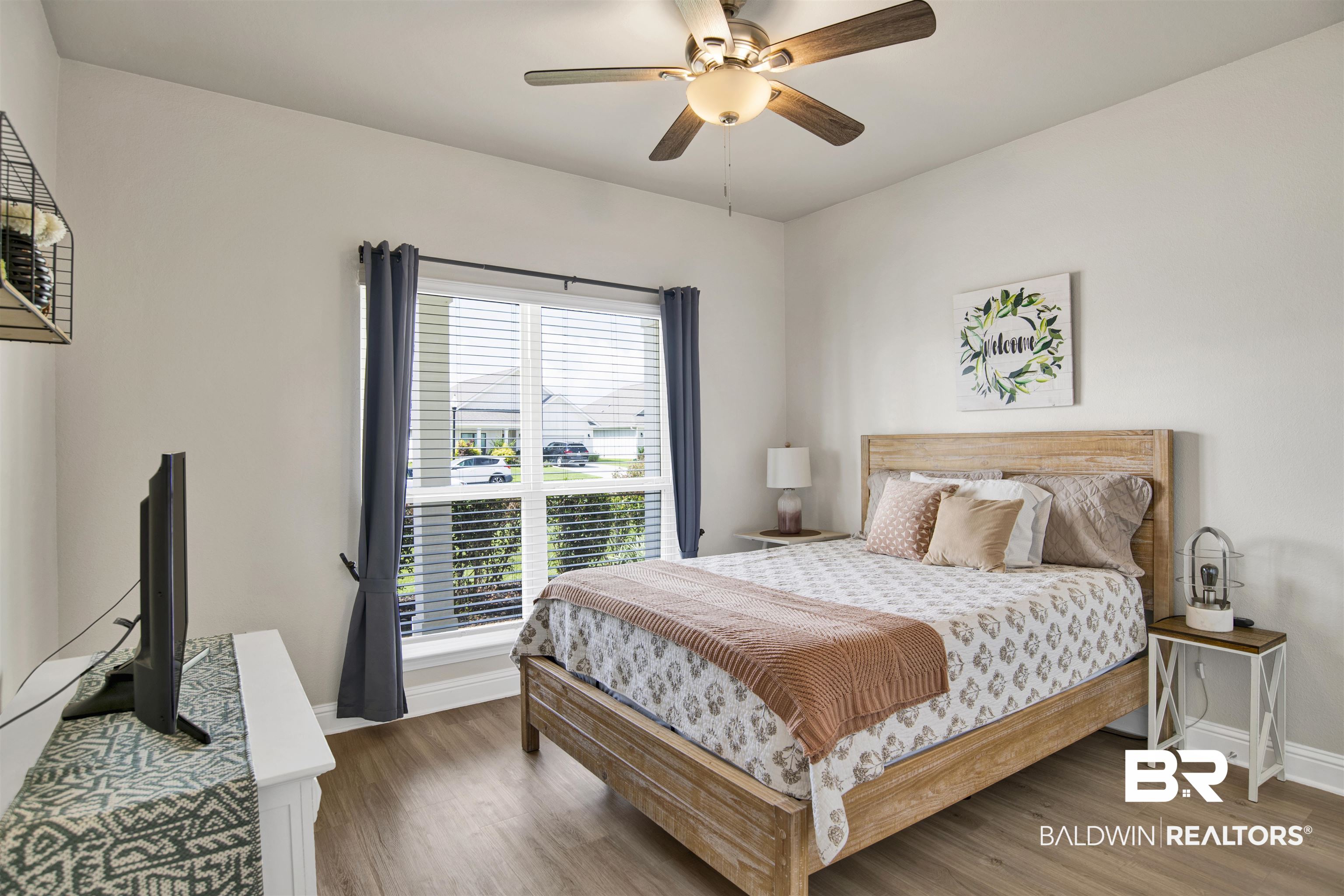 9431 Swan Point Road Daphne, AL 36526 - Photo 26 of 35 Bedroom with wood finished floors and a ceiling fan