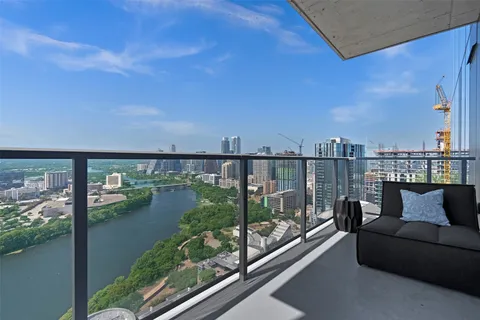 a view of a balcony with lake view