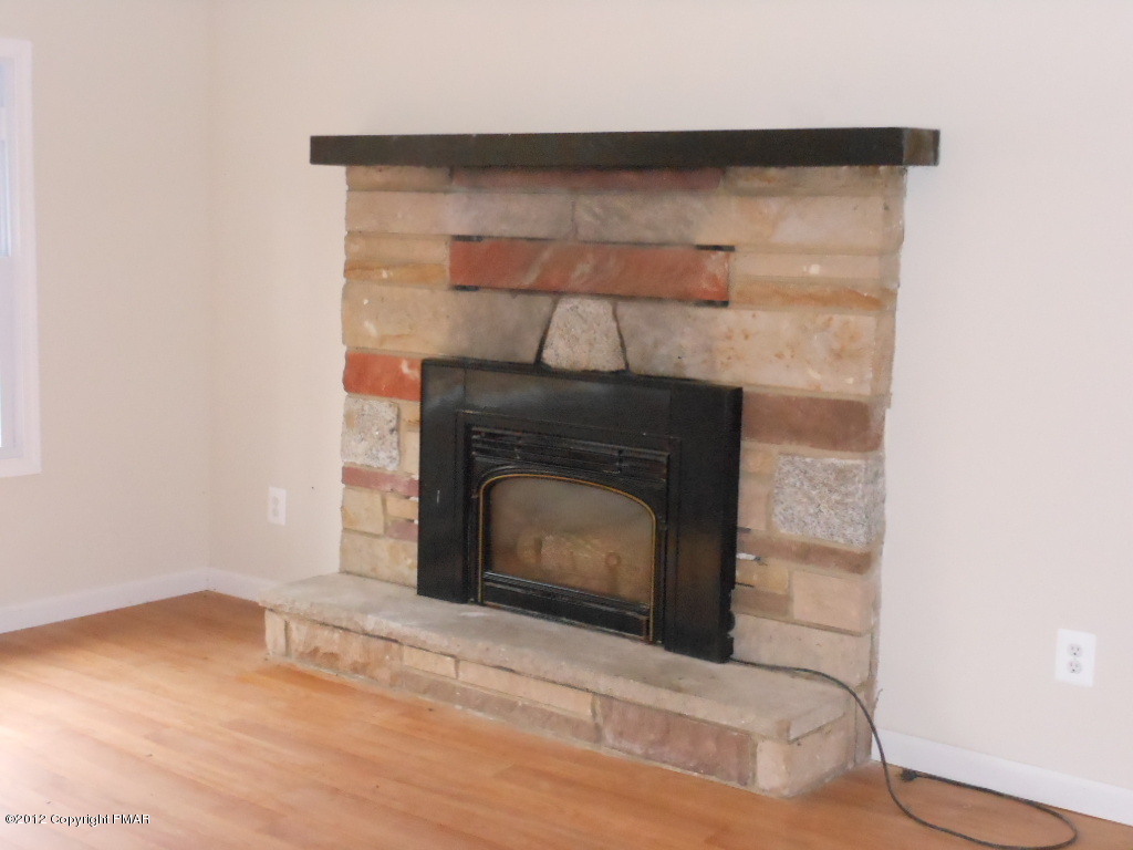 52 Locust Ridge Road Pocono Lake, PA 18347 - Photo 4 of 8 Fireplace
