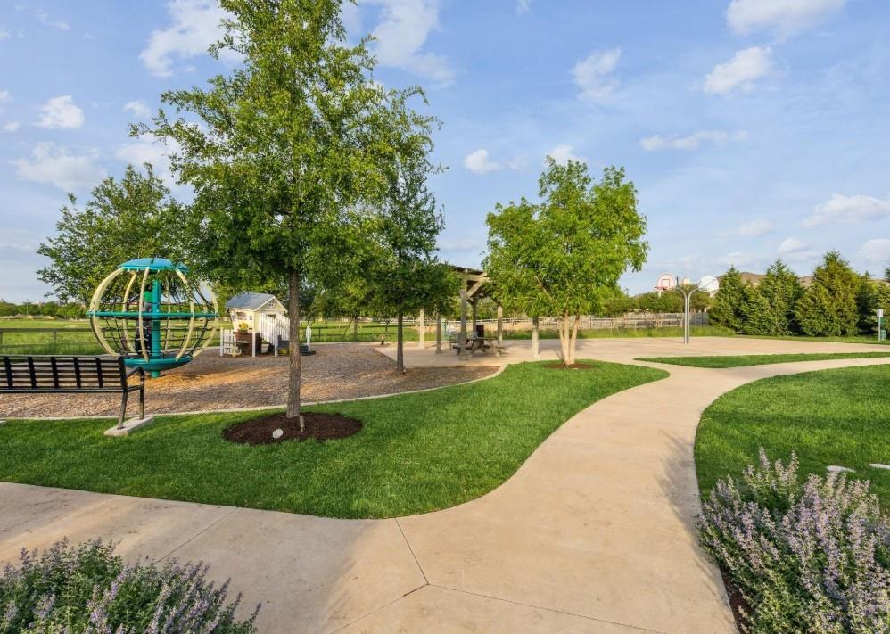 916 Falcon Road Argyle, TX 76226 - Photo 35 of 37 View of jungle gym with a yard and basketball hoop