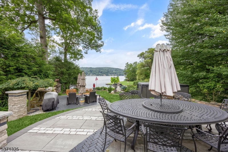 590 West Shore Trail Sparta, NJ 07871 - Photo 28 of 41 a view of a patio with a table and chairs
