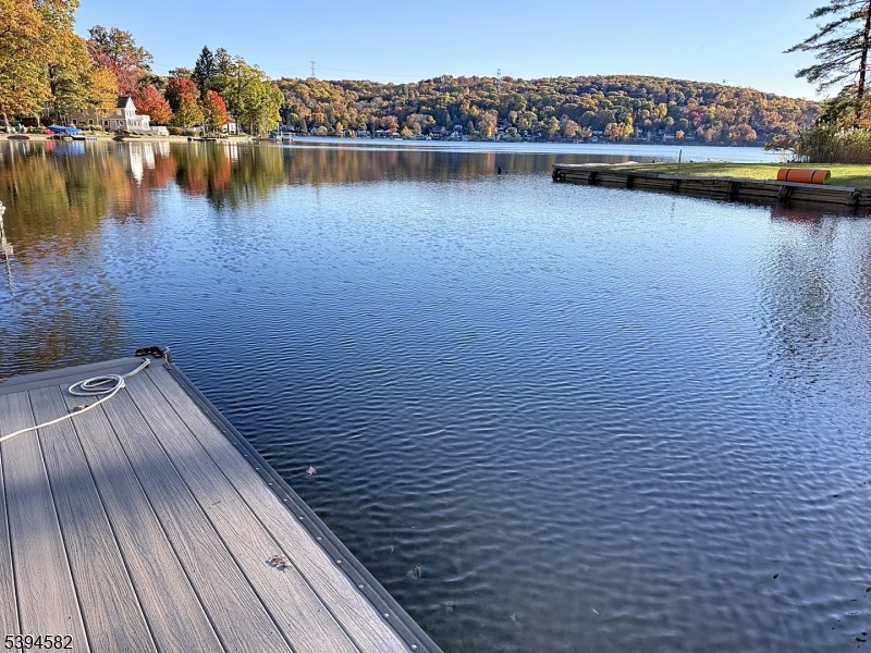 590 West Shore Trail Sparta, NJ 07871 - Photo 3 of 41 a view of a lake with houses