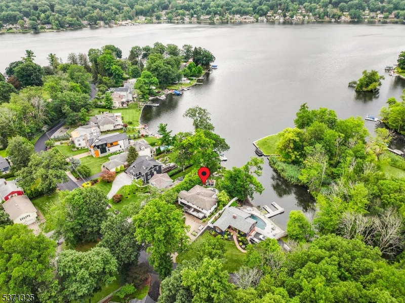 590 West Shore Trail Sparta, NJ 07871 - Photo 35 of 41 an aerial view of a house with a yard and lake view
