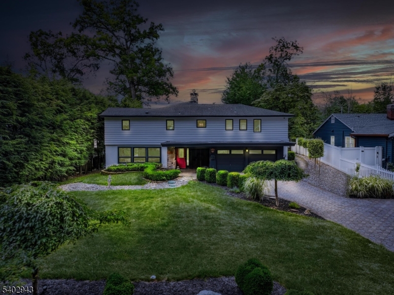590 West Shore Trail Sparta, NJ 07871 - Photo 41 of 41 a view of a house with a yard and potted plants