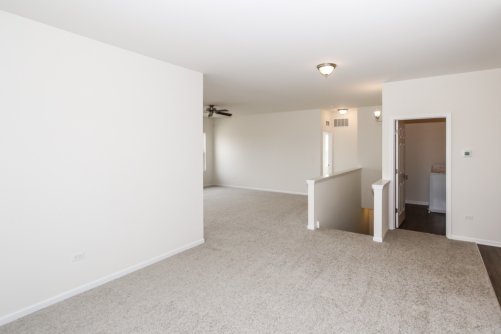 904 Sharp Drive, Unit 1593 Plano, IL 60545 - Photo 10 of 39 a view of empty room