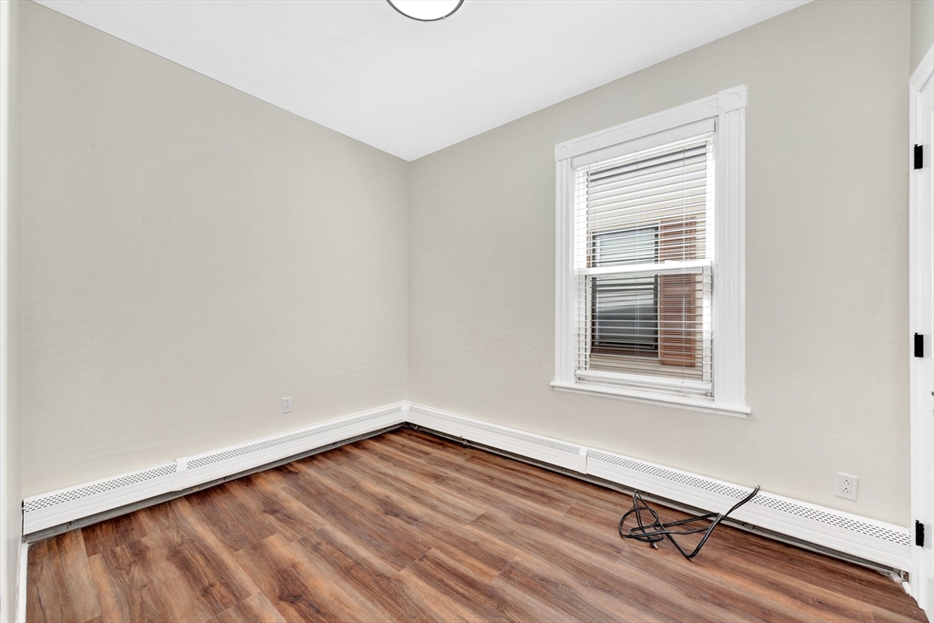 16 O Street, Unit 2 Boston, MA 02127 - Photo 15 of 19 an empty room with a window