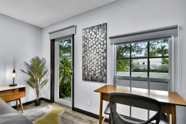 a kitchen with cabinets and steel stainless steel appliances