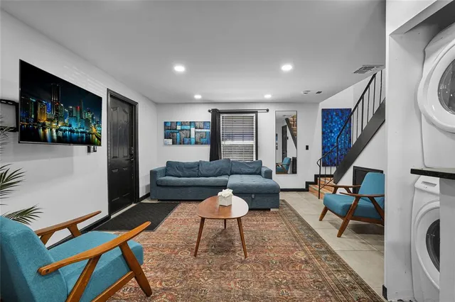 a bedroom with a bed and a table in it