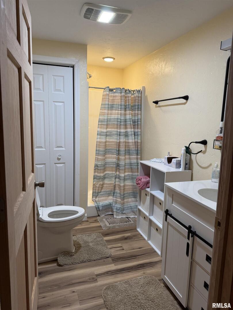 5435 Hickory Ridge Road Pomona, IL 62975 - Photo 32 of 67 a bathroom with a sink and a mirror