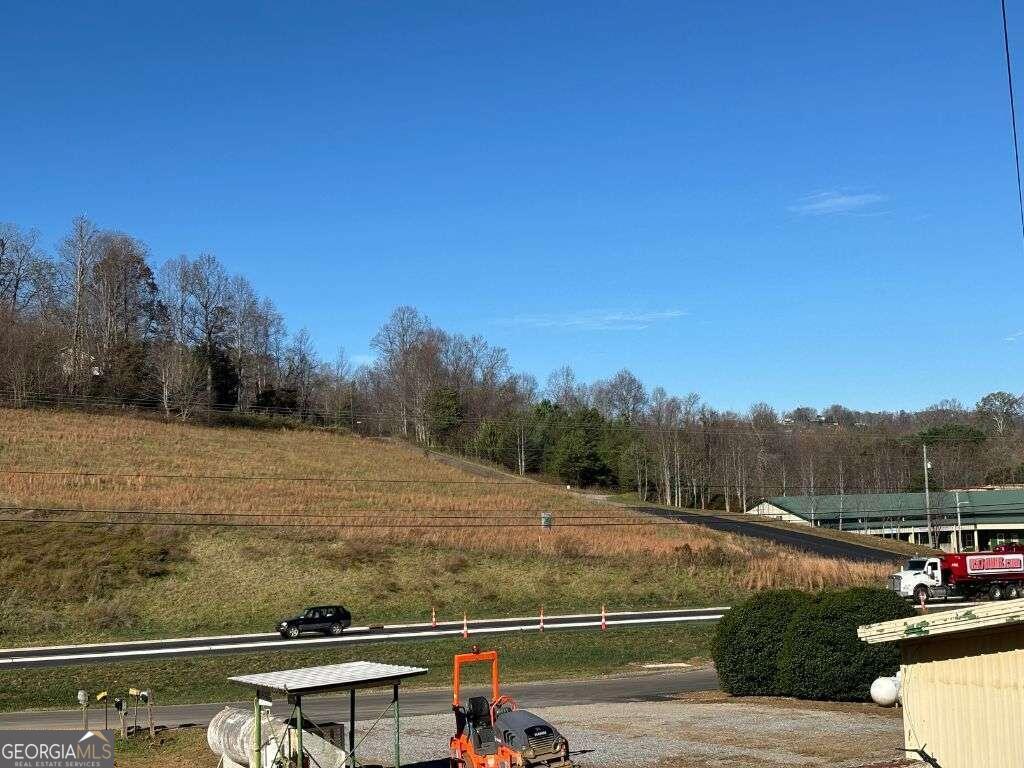 1 Windy Ridge Lane Hayesville, NC 28904 - Photo 12 of 26 a view of a tennis court with trees in the background