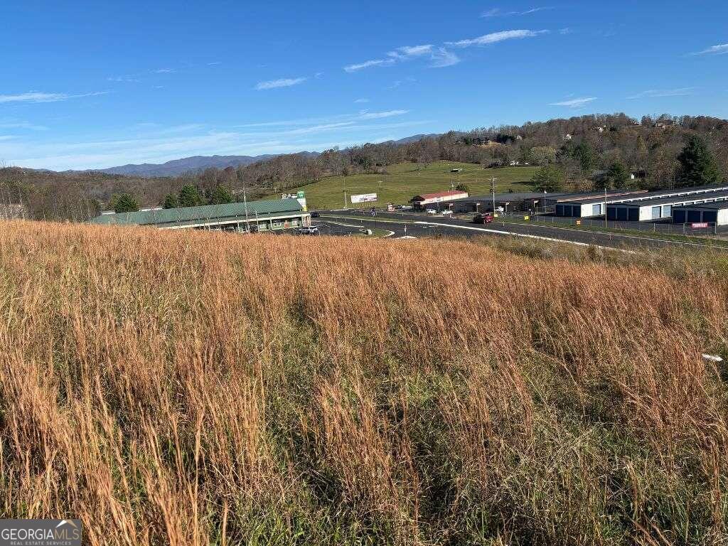 1 Windy Ridge Lane Hayesville, NC 28904 - Photo 3 of 26 a view of a lake with mountains in the background