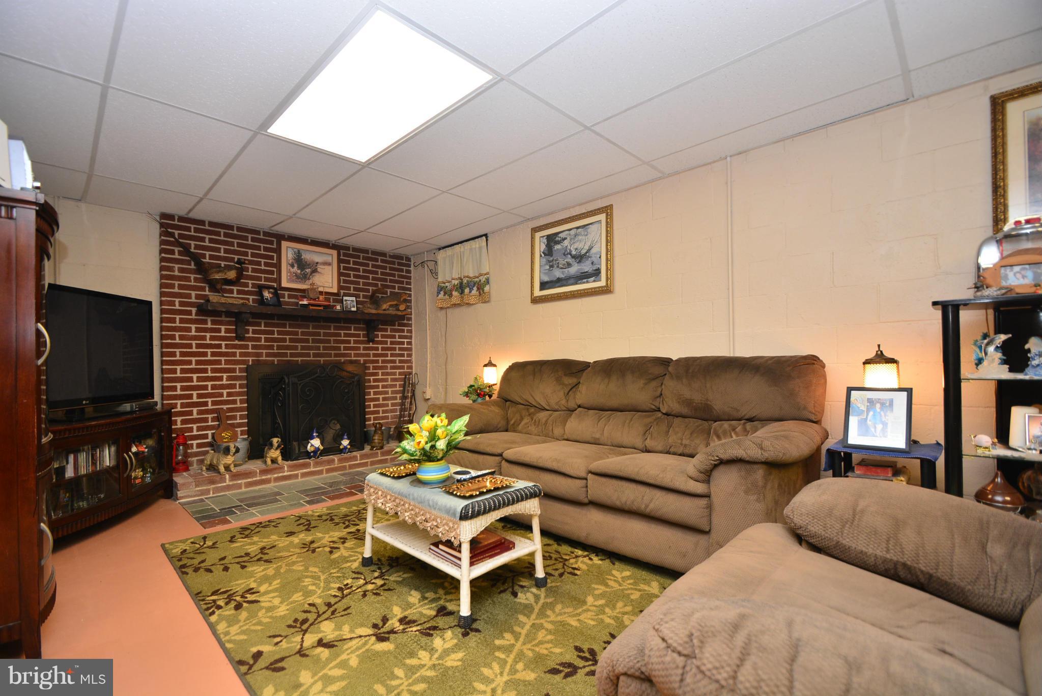 1002 South Stepney Road Aberdeen, MD 21001 - Photo 16 of 30 Family room with fireplace