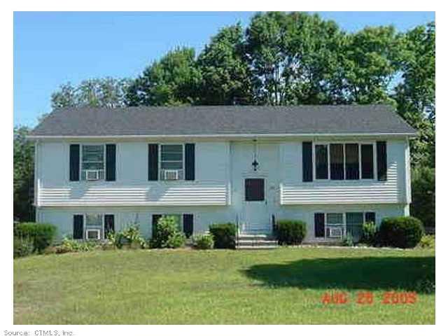 20 Melinda Terrace Killingly, CT 06239 - Photo 1 of 1 a front view of a house with a yard