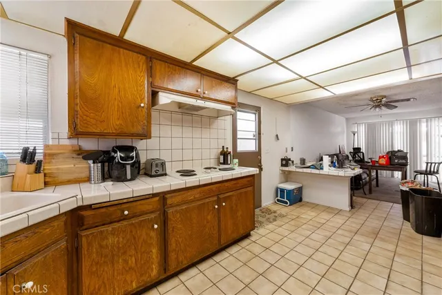 a large kitchen with a lot of counter top space