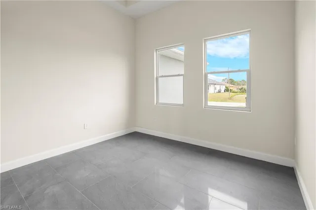 an empty room with windows