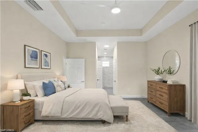 an empty room with a empty space and a ceiling fan