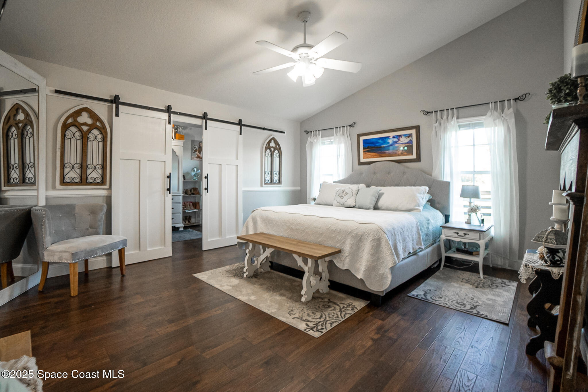 1868 Druliner Road St. Cloud, FL 34771 - Photo 19 of 57 a bedroom with a bed and a flat screen tv