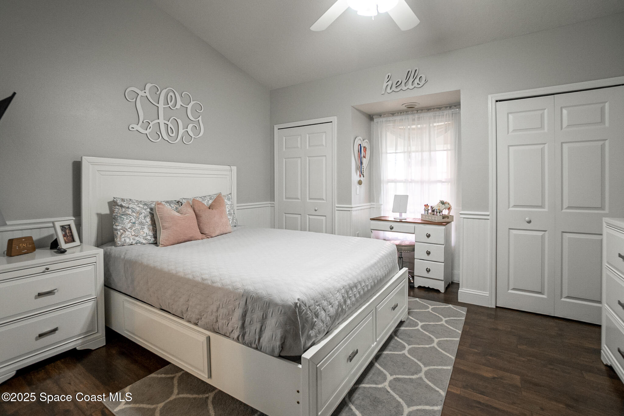 1868 Druliner Road St. Cloud, FL 34771 - Photo 29 of 57 a bedroom with a bed and a dresser
