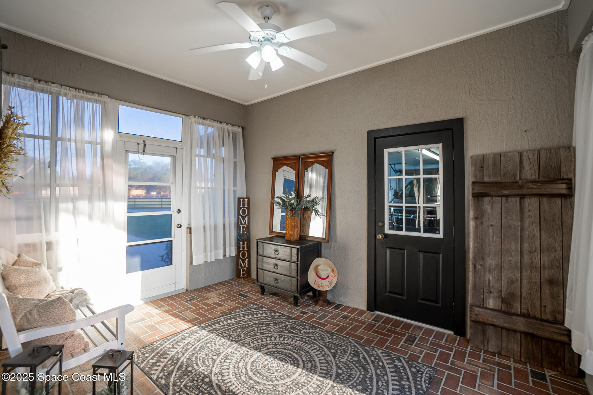 1868 Druliner Road St. Cloud, FL 34771 - Photo 41 of 57 a bedroom with a bed and wooden floor