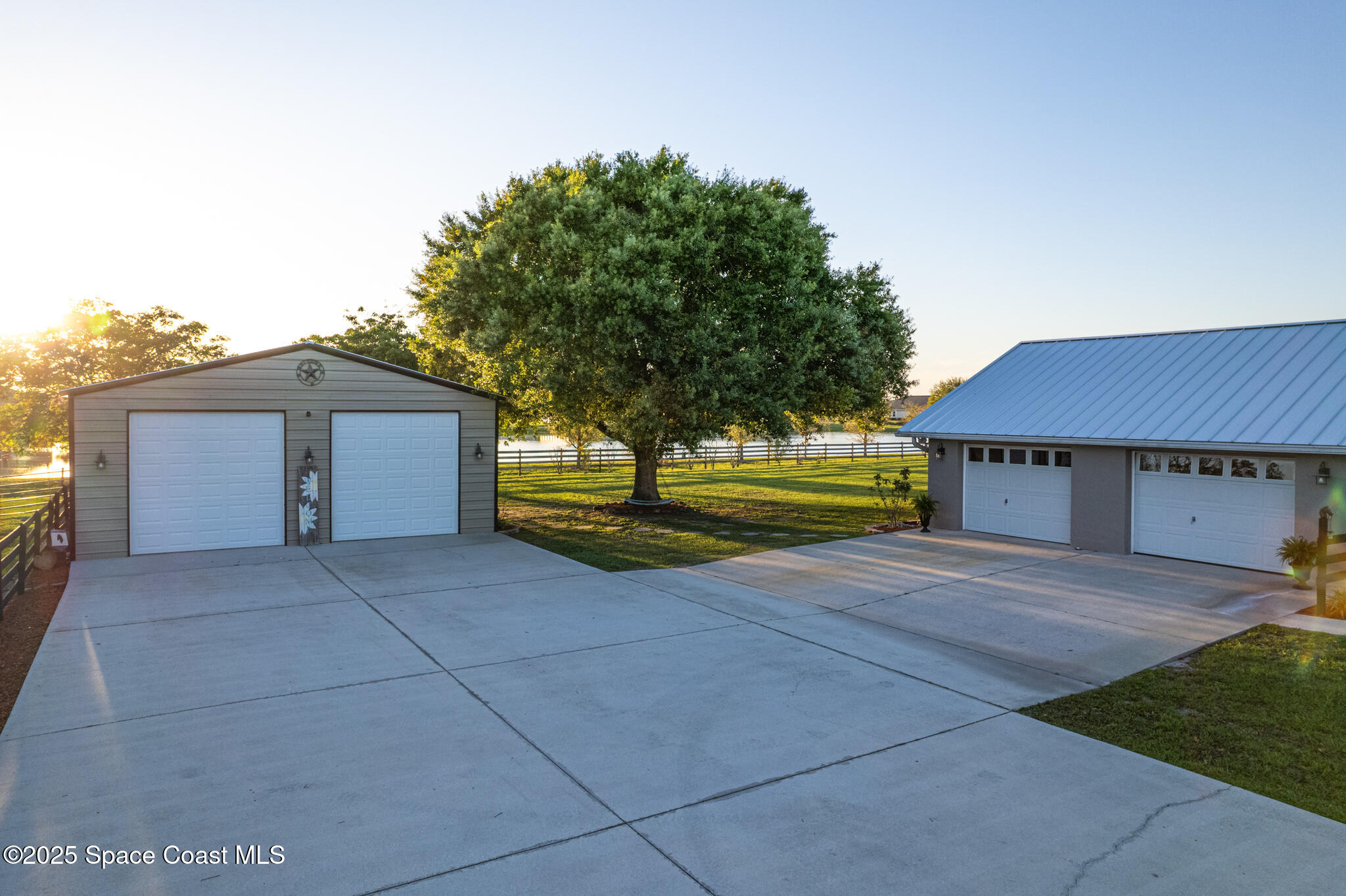 1868 Druliner Road St. Cloud, FL 34771 - Photo 48 of 57 a view of house with outdoor space and trees in the background