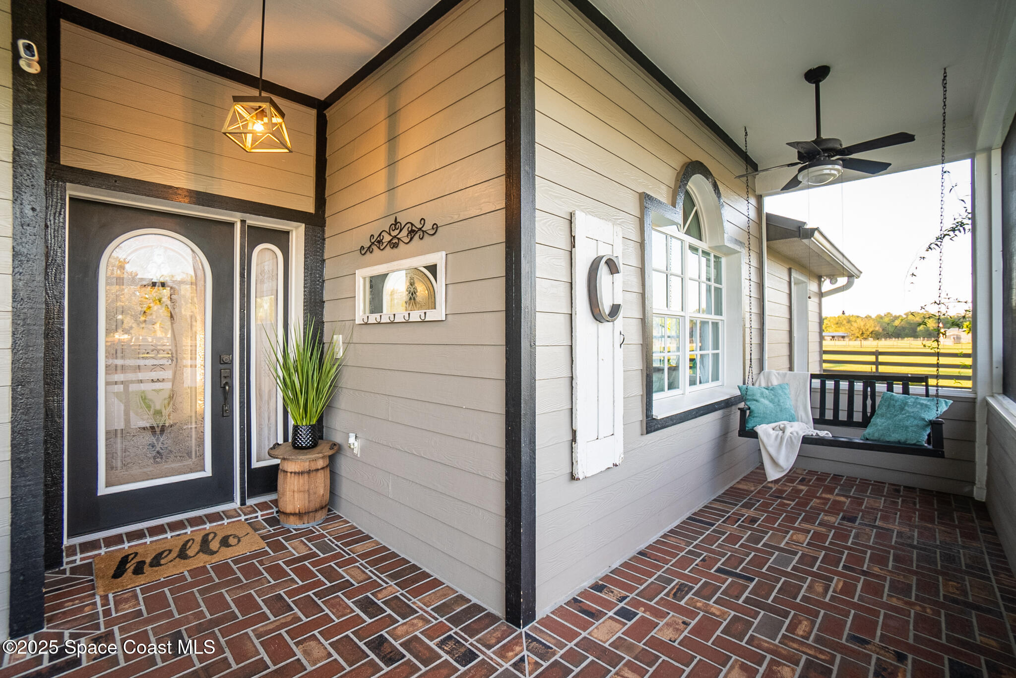1868 Druliner Road St. Cloud, FL 34771 - Photo 5 of 57 a view of a house with a porch