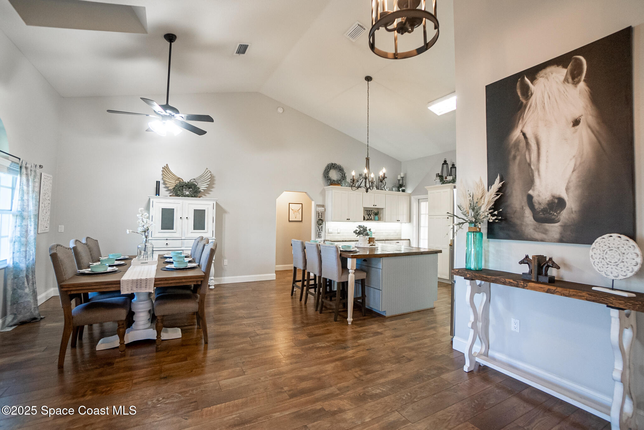 1868 Druliner Road St. Cloud, FL 34771 - Photo 6 of 57 a view of a dining room with furniture and chandelier