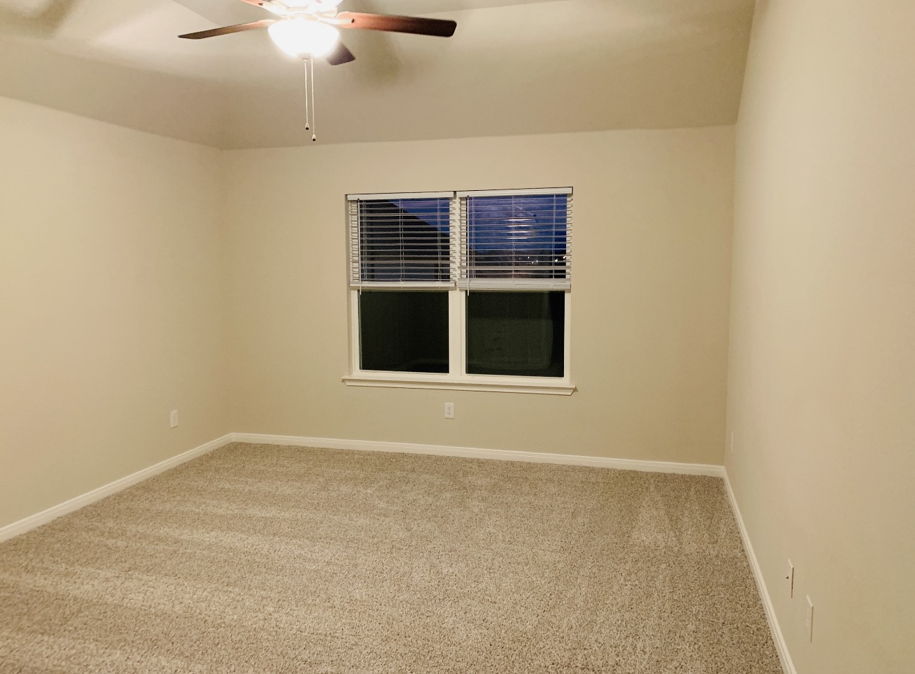 808 Fallbrook Drive Temple, TX 76502 - Photo 29 of 36 Carpeted empty room featuring a ceiling fan and baseboards