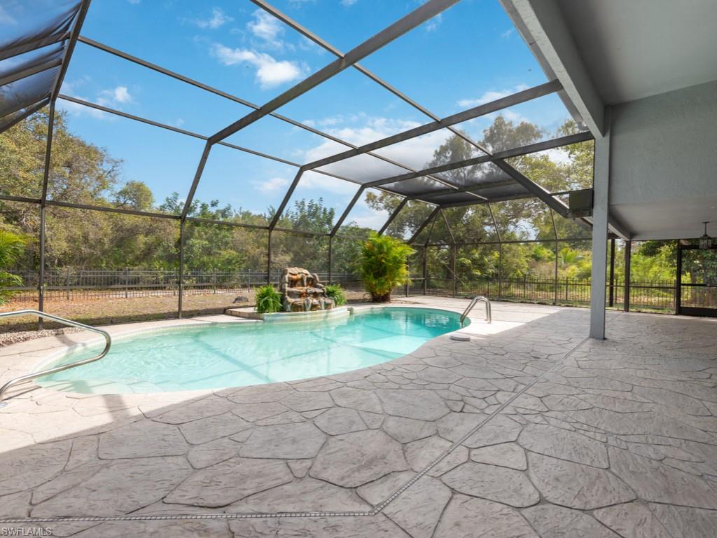 7016 Trail Boulevard Naples, FL 34108 - Photo 22 of 26 a view of yard with a porch