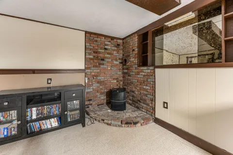 a view of entryway with painting on the wall