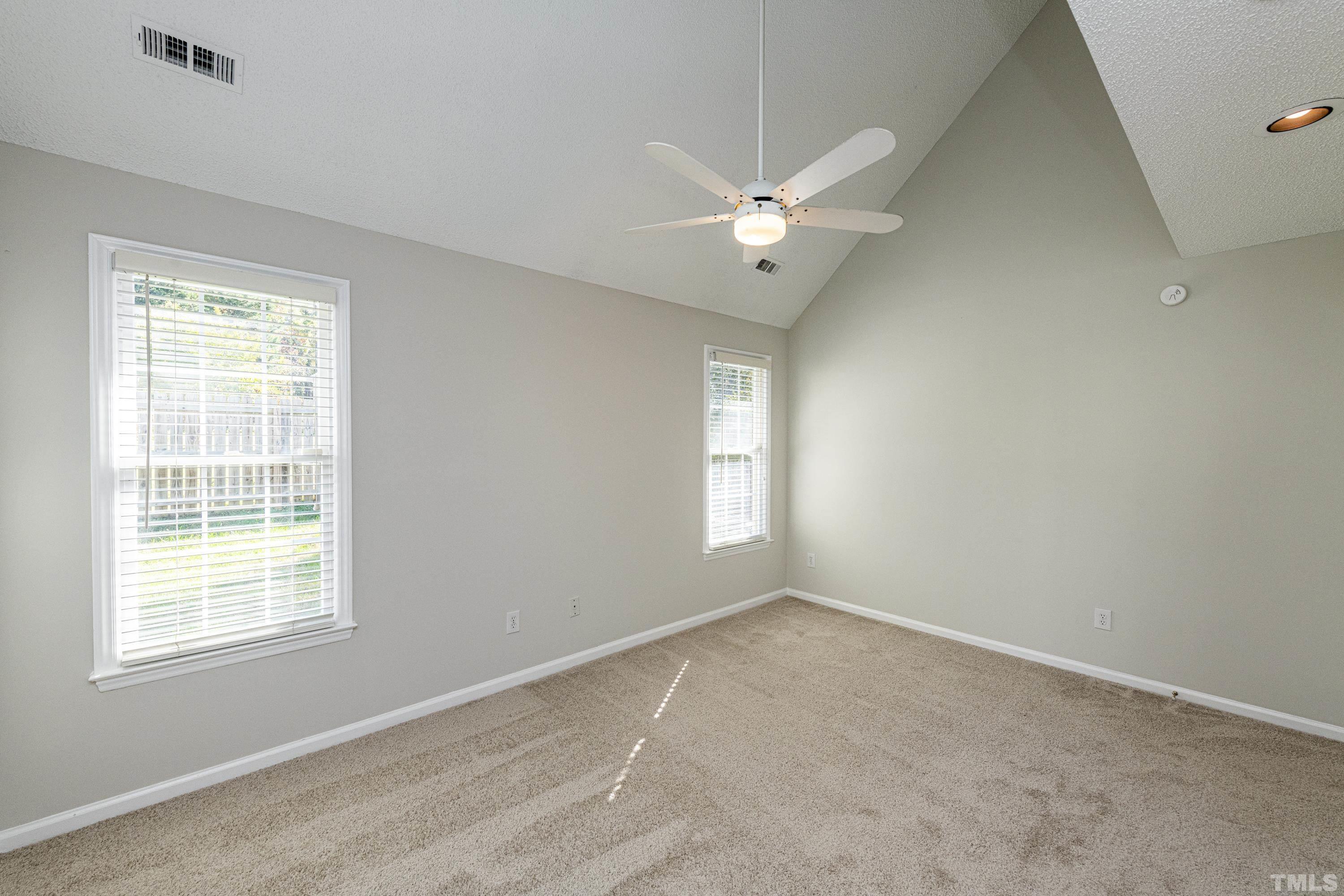 5317 Tilford Lane Raleigh, NC 27613 - Photo 17 of 29 a view of an empty room with a window