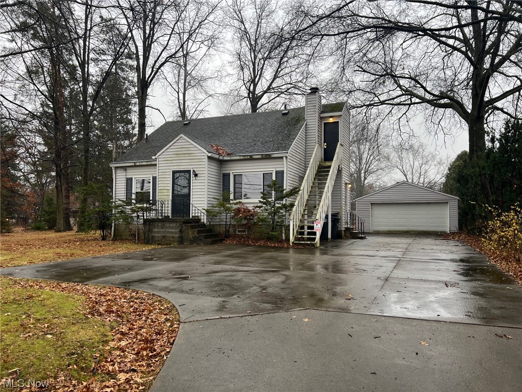 2900 Mogadore Road Akron, OH 44312 - Photo 1 of 34 View of front of property with a garage