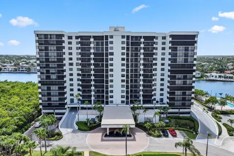 a front view of a building with garden